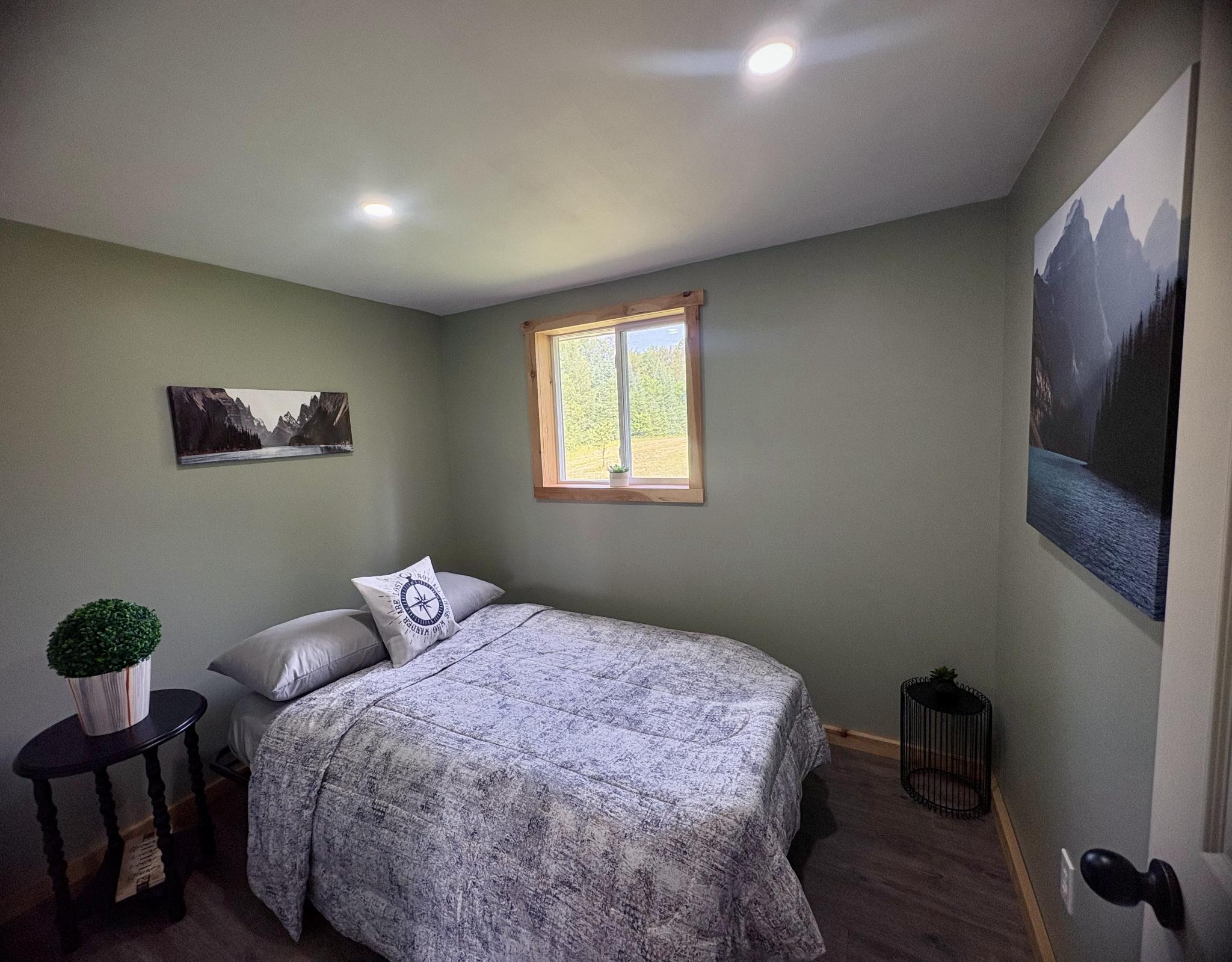 Bedroom with queen bed